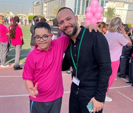 Teacher of AIS, an Abu Dhabi private school, with a special needs student