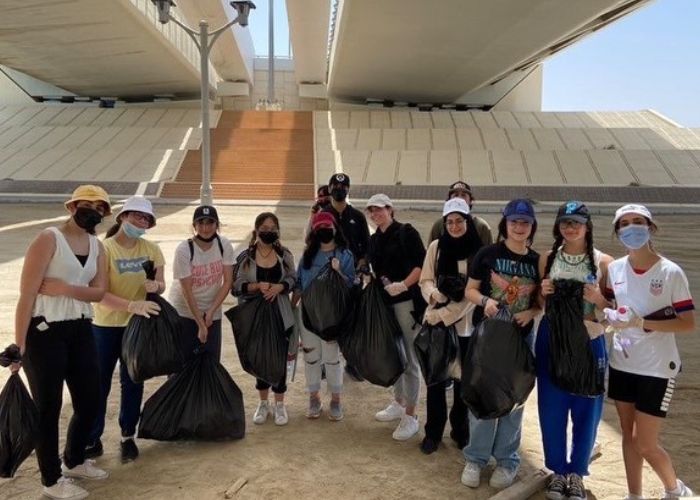 Students of Abu Dhabi International School engaging in local cleanliness drives