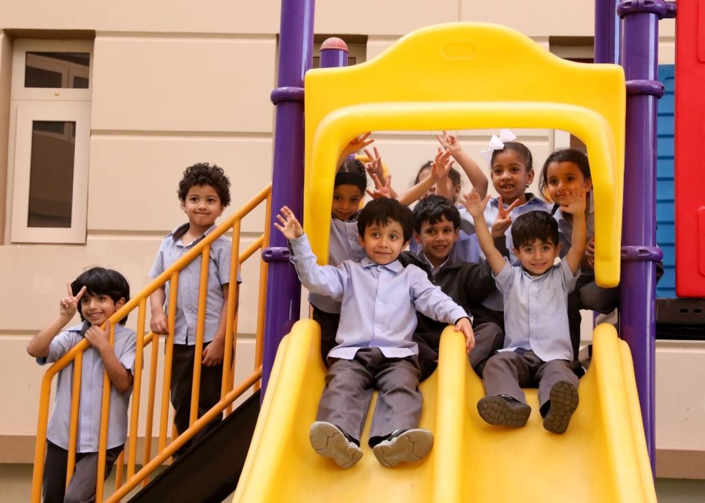 Students in the playgroud of AIS, one of the top kindergartens in Abu Dhabi