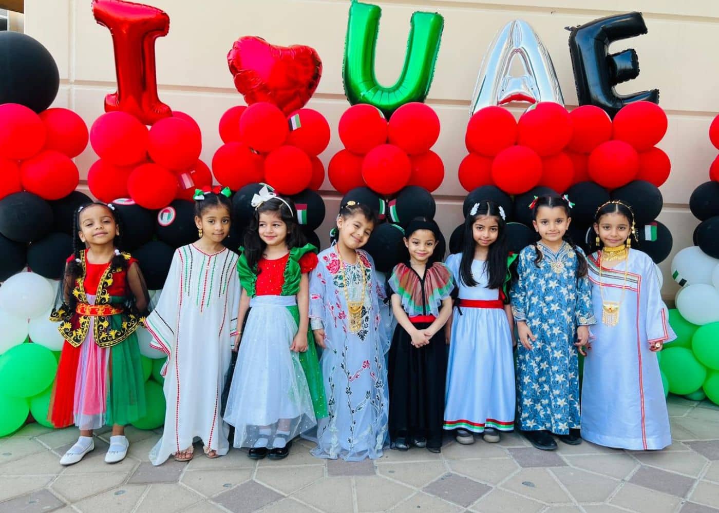Students of Abu Dhabi International School at the National Day event